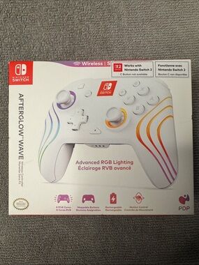 NIB Nintendo Switch Afterglow Wave Wireless Controller with Rainbow Accents
